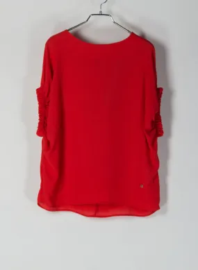 blusa fiocco posteriore