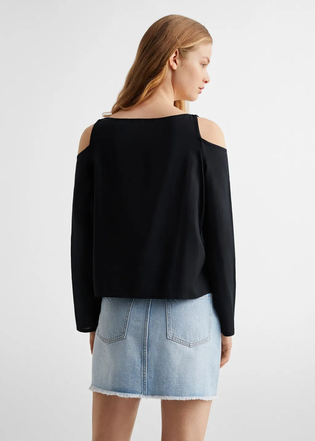 Blusa fluida spacco spalle