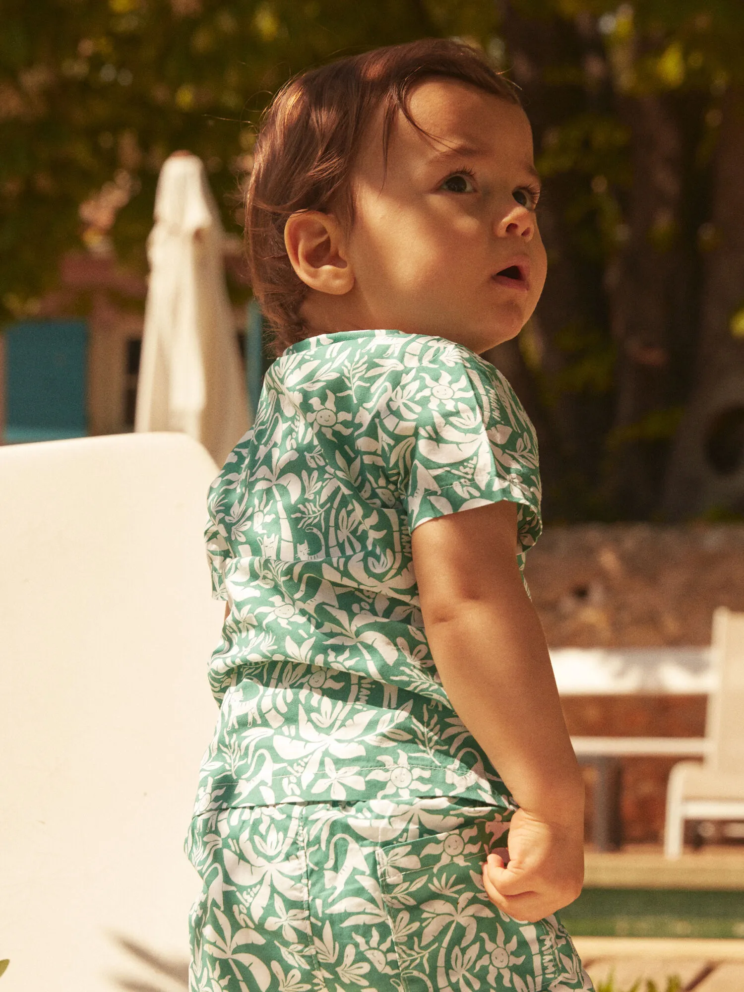 Camicia verde con stampa palme e soli    